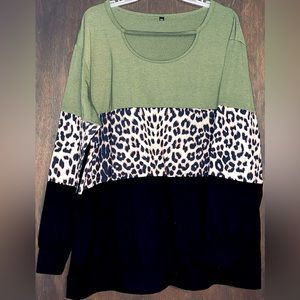Leopard, black, and green color block shirt.